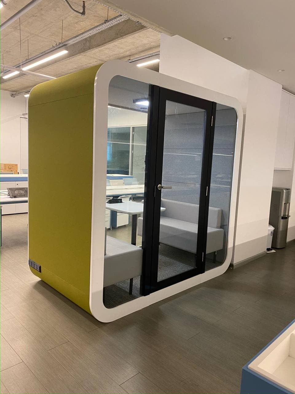 Real QAkustik project photographed inside an active office