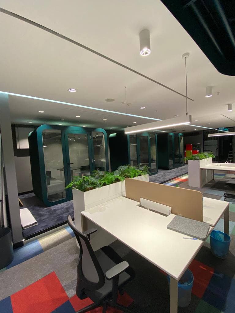 Real QAkustik project photographed inside an active office