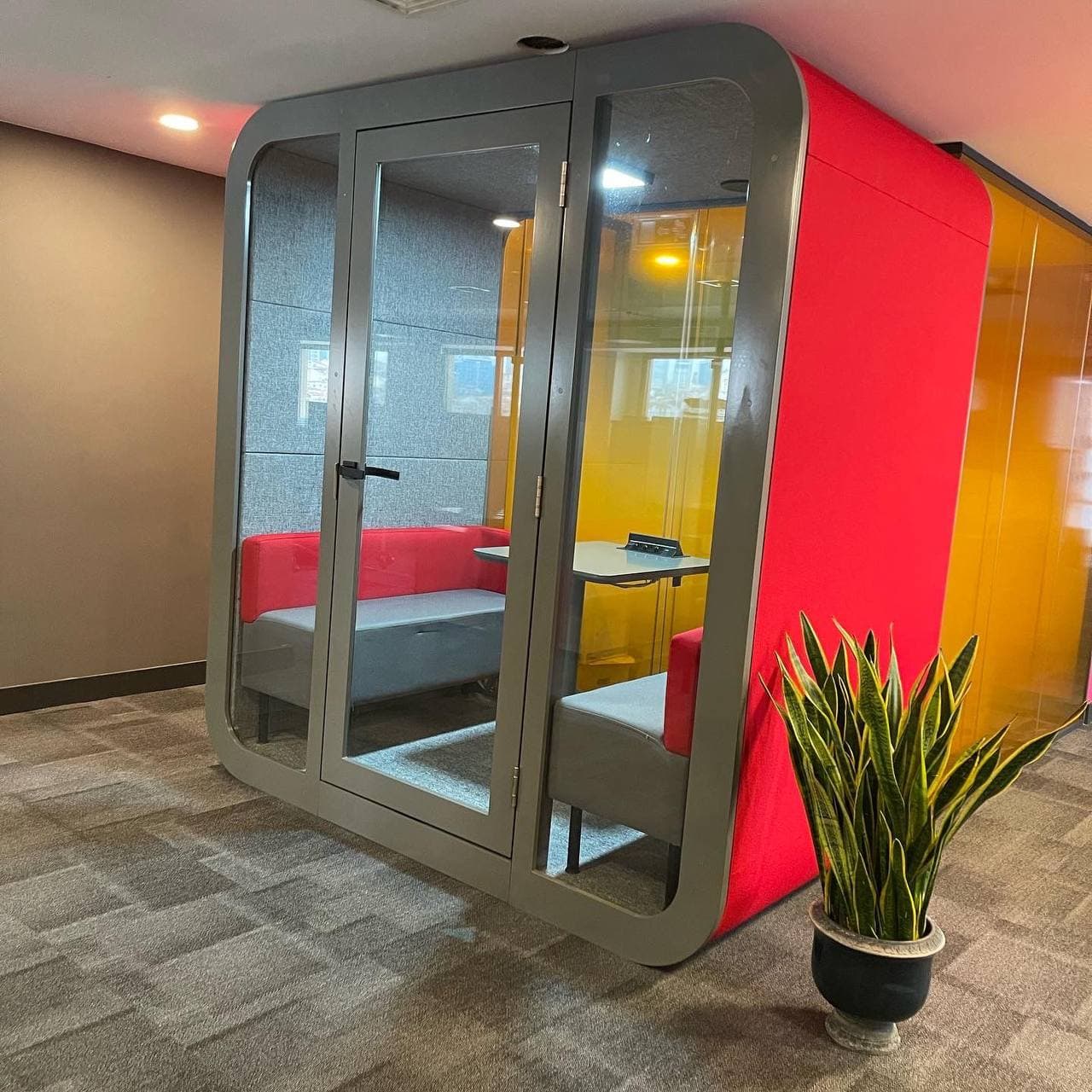 Real QAkustik project photographed inside an active office