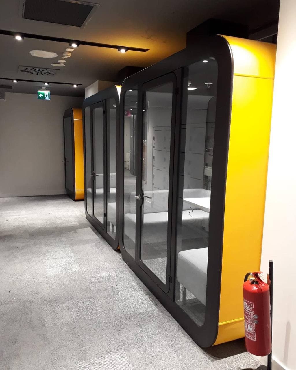 Real QAkustik project photographed inside an active office