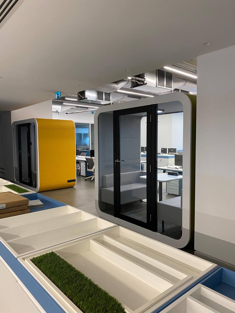 Real QAkustik project photographed inside an active office