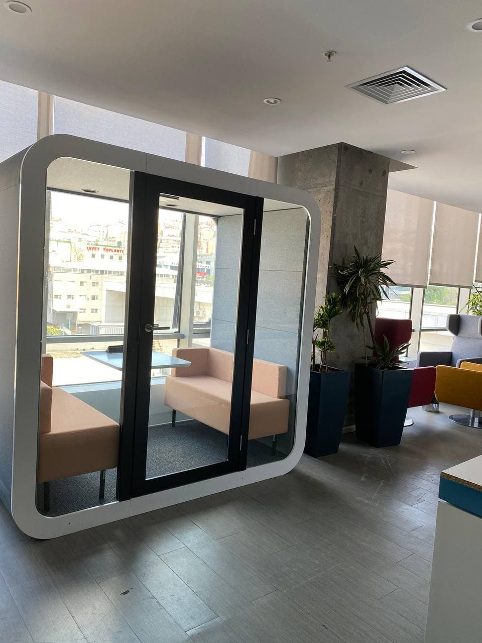 Real QAkustik project photographed inside an active office